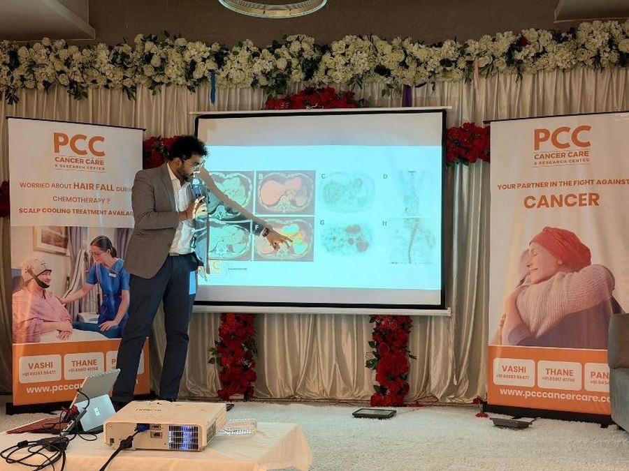 Doctor presenting precision oncology slides at the PCC Doctors' Day session